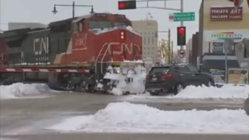 UPDATE: Two cars stuck on railroad tracks hit by trains 